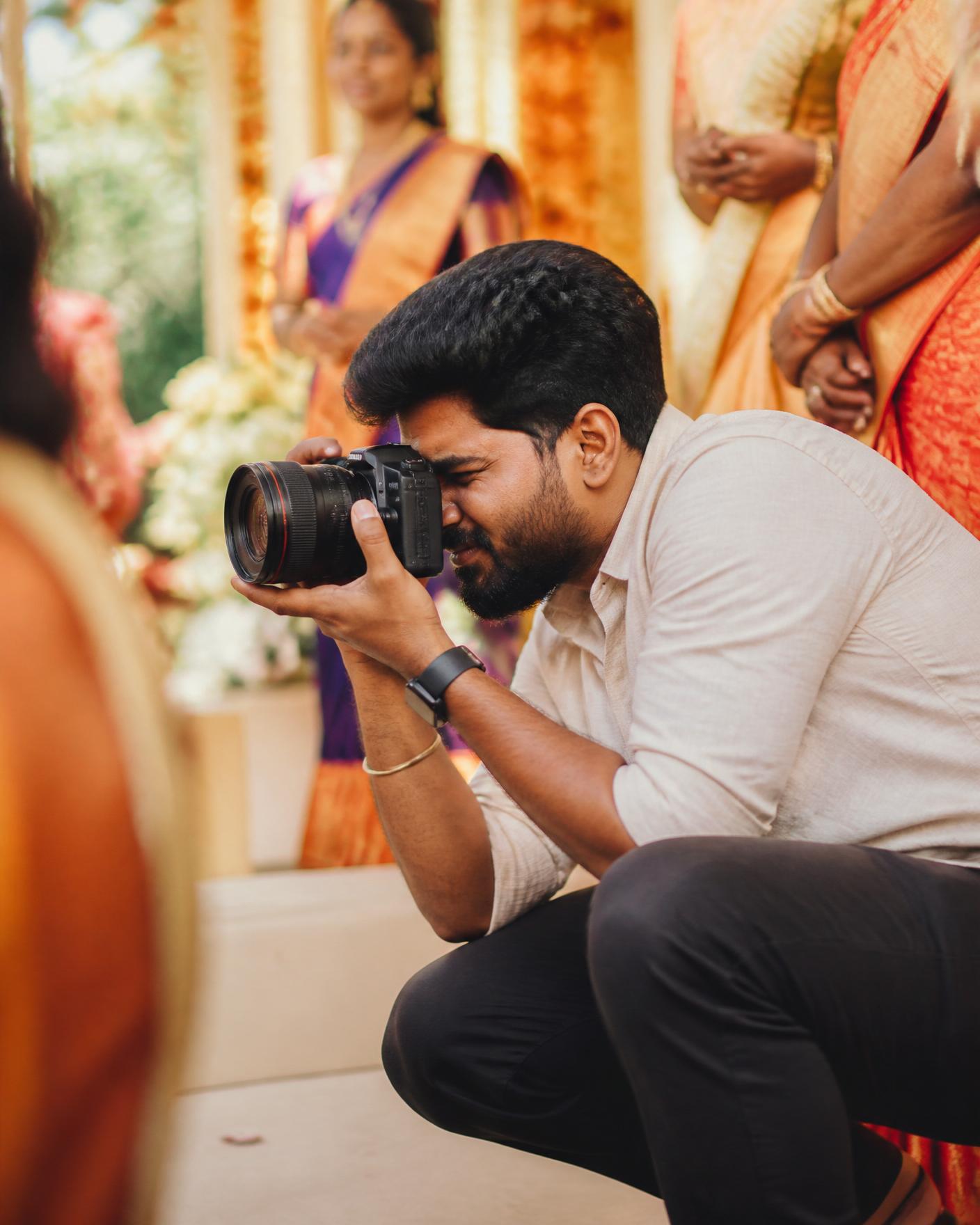 The founder of Fable & Flare photographing candidly at an Indian wedding